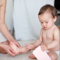 toddler massage. Child massage. Foot reflexology massage. 